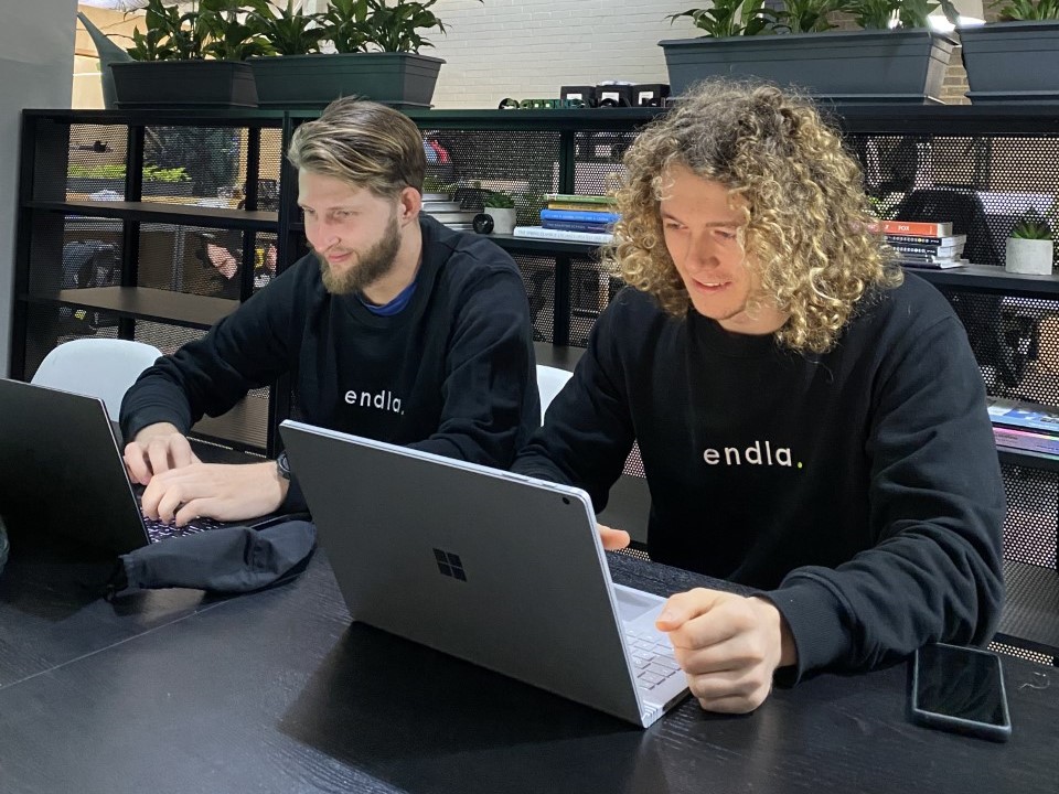 Riley and Michael working together before demo day.